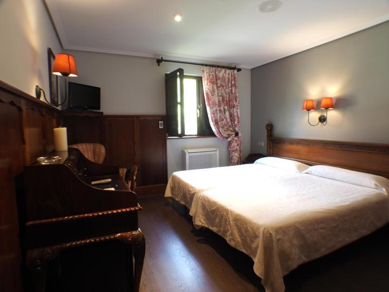 Hotel Comillas Quarto foto